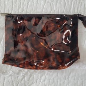 Calvin Klein Plastic Tortoise Print Cosmetic Bag EUC Zipper Closure